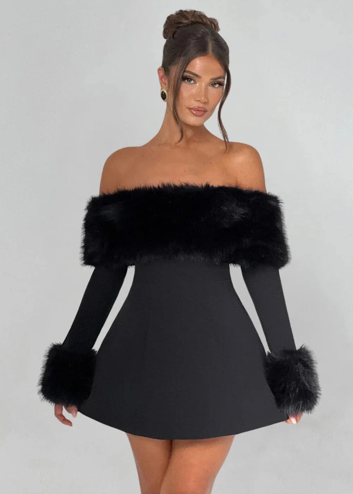 Black off-shoulder mini dress with plush fur detailing, perfect for a chic and stylish look for a special occasion.