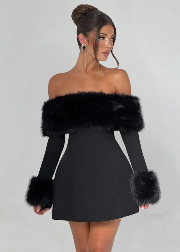 "Black off-shoulder mini dress with faux fur accents, perfect for a statement look. Stylish design with a flirty touch."