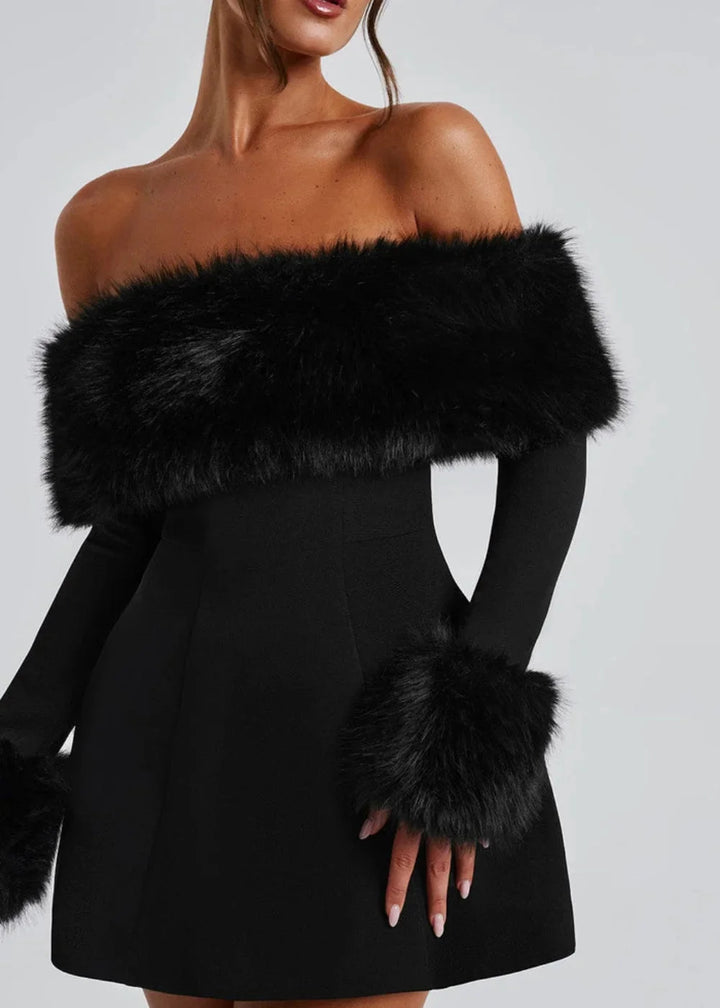 Black off-shoulder mini dress with fur accents, sleek and stylish, perfect for a night out or special event.