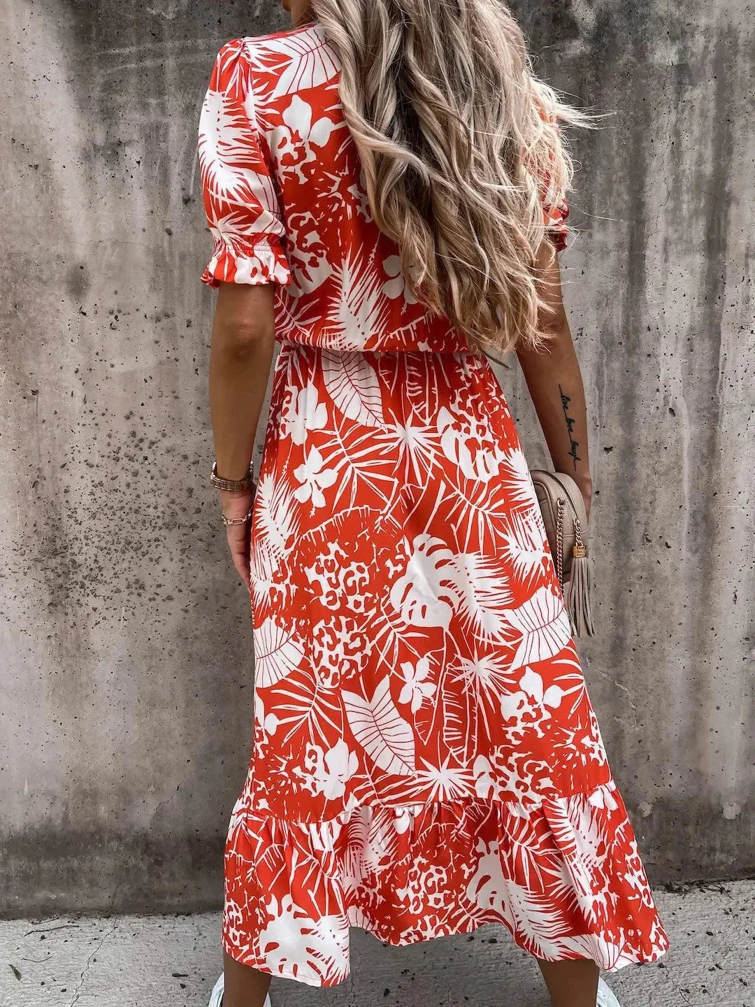 Floral print midi dress with wrap front design, crafted in vibrant colors - Athena collection.