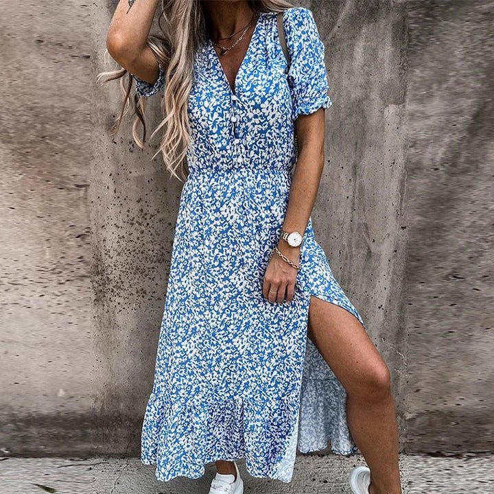 Blue floral midi dress with wrap front by Athena. Made with comfortable and breathable fabric, perfect for casual or formal…