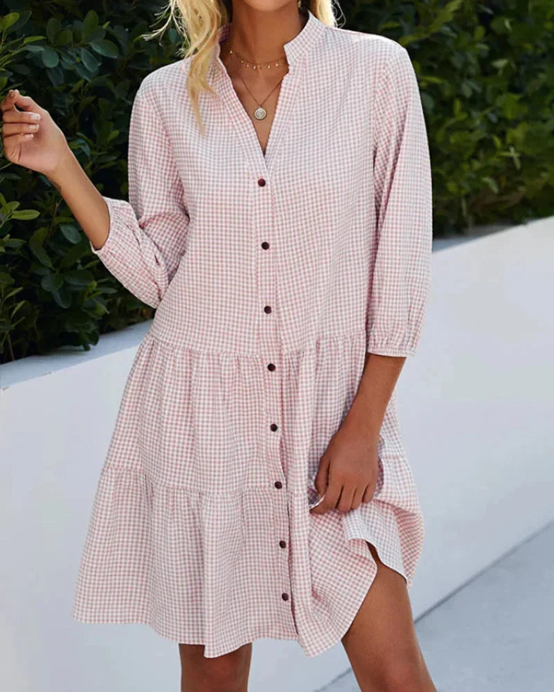 Tiered button-up midi dress with collar in a soft cotton blend fabric, featuring a flowy silhouette and delicate button…