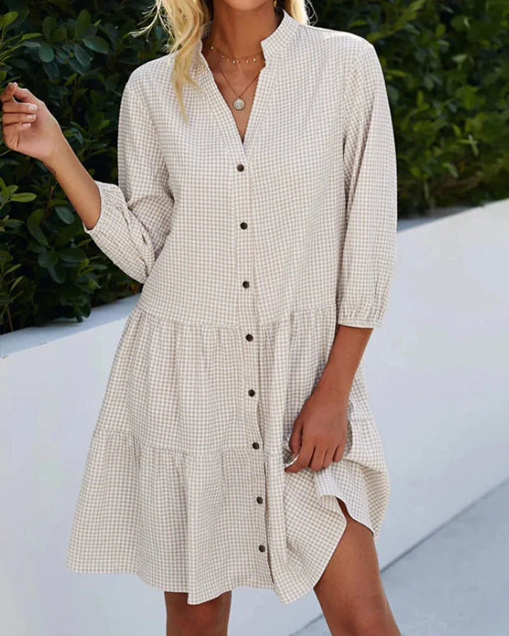 Khaki tiered button-up midi dress with collar, designed in airy and flowy fabric for a relaxed and chic look.