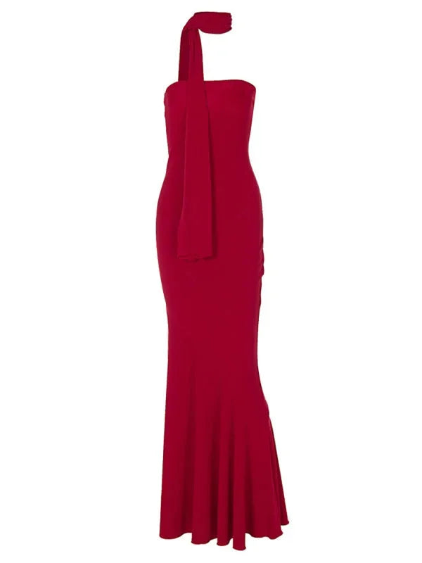 Strapless dress in bold scarlet red with detachable scarf, mermaid silhouette, and lace detail.