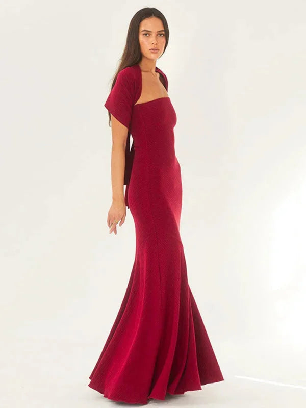 Strapless mermaid dress in soft velvet with scarf detail.