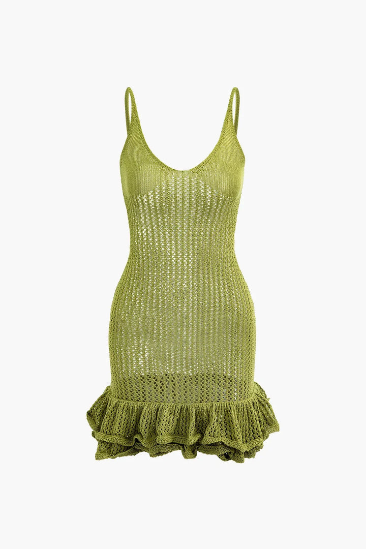 "Textured mini dress with playful ruffles, perfect for a fun and flirty look. A chic addition to your wardrobe."