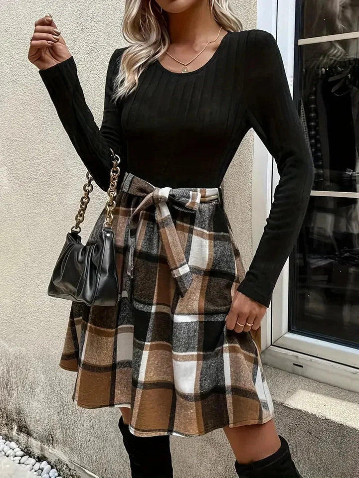 "Blayke Black Fitted Top with A-line Check Skirt featuring a stylish A-line design and check pattern in brown black."