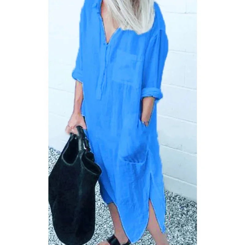 Light blue linen dress with a relaxed-fit button-up design, exuding comfort and style for casual chic looks.