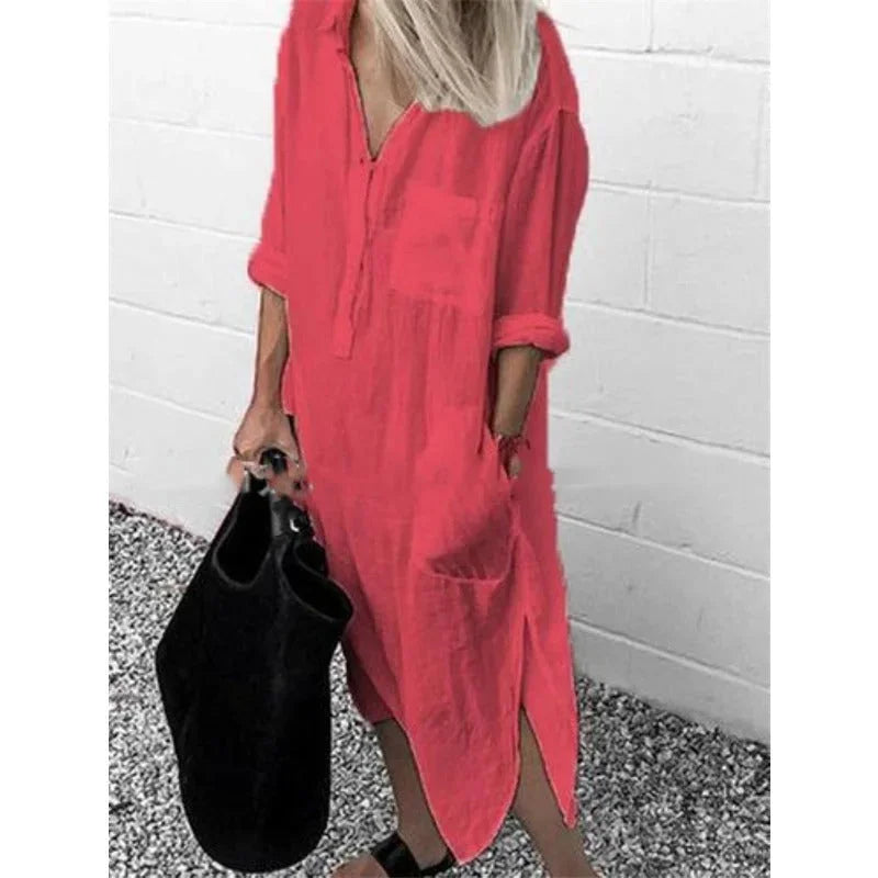 Red linen dress with a relaxed fit, button-up front. Casual and comfortable style perfect for everyday wear.