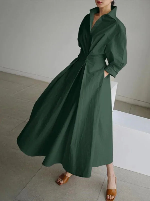 Light green flowing collar dress with cinched waist, perfect for a casual chic look. Made of soft, breathable fabric for…