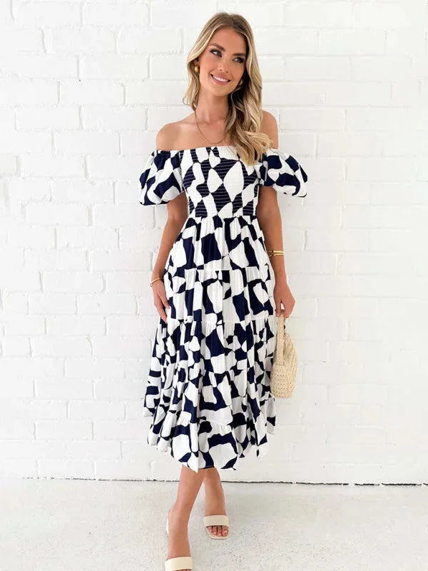 Lightweight and airy floral tiered dress perfect for summer days, featuring a flowing design and whimsical print named…