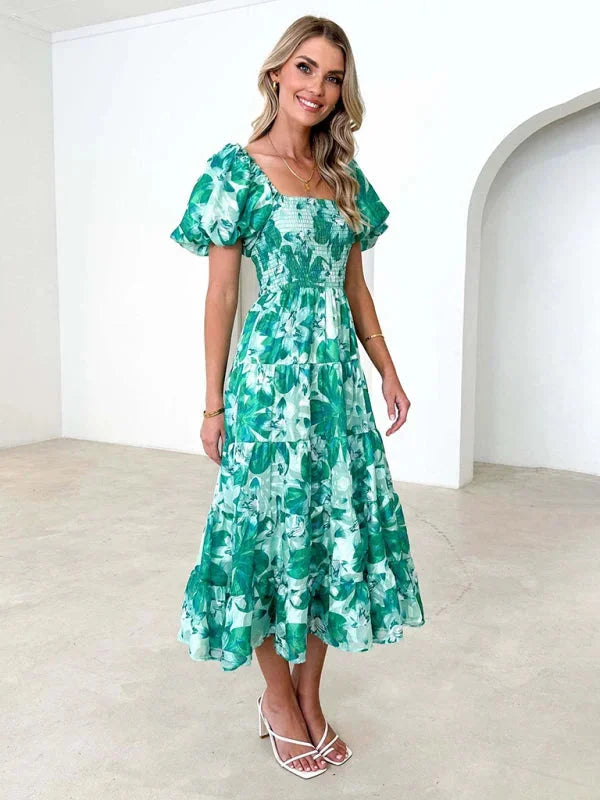 "Floral tiered summer dress in lightweight flowy fabric, perfect for warm days"