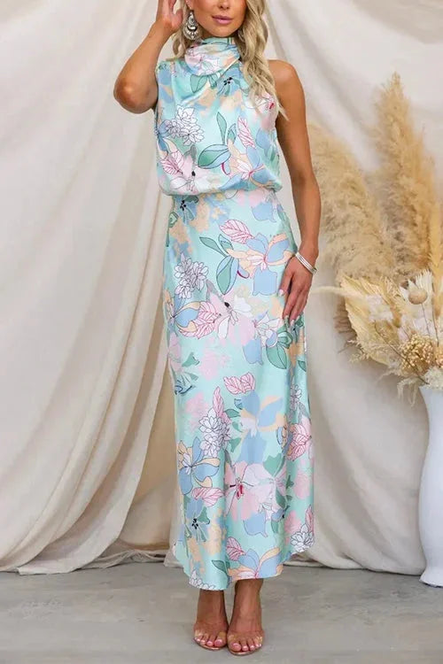 Pastel floral maxi dress with a high neck, perfect for spring.