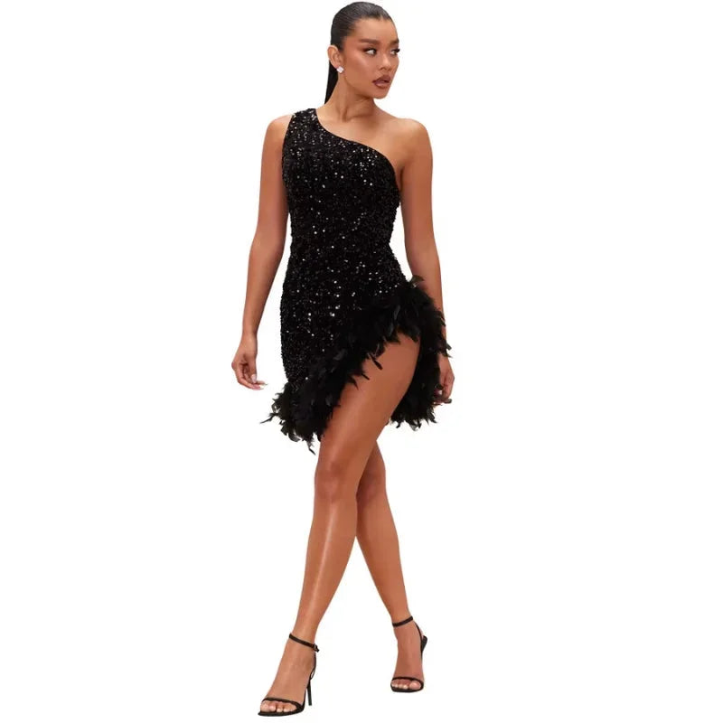 Asymmetrical feather-trim sequin dress in Black glitter, showcasing a modern design with a playful touch of feathers.