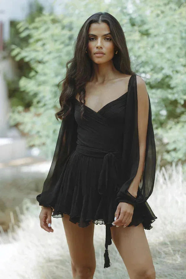 "Black Flowy ruffled mini dress with sleeves, soft and lightweight fabric, perfect for effortless style and comfort"