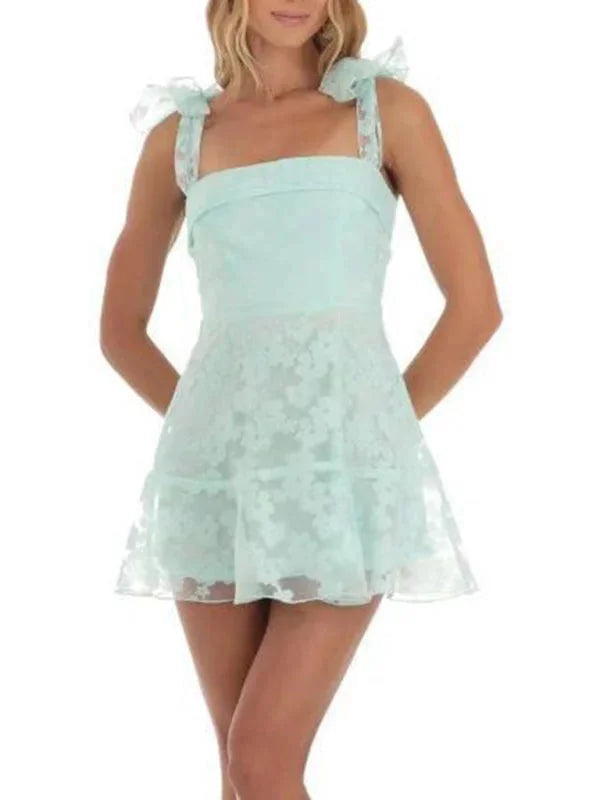 Mint green A-line mini dress featuring elegant lace detailing, perfect for a chic look.