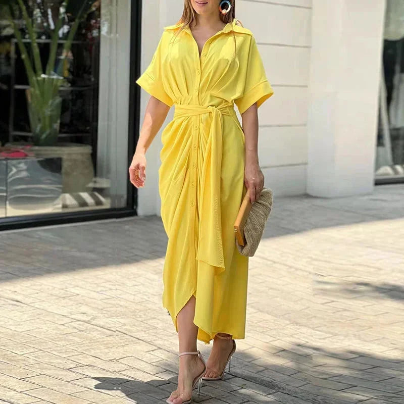 Yellow midi dress with abstract print and belt. Soft rayon material with a stylish design perfect for a casual day out or…