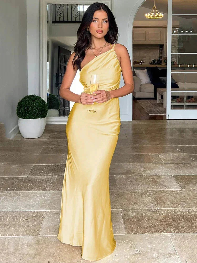 One-shoulder satin maxi dress in an elegant and flowing design, perfect for any special occasion or event.