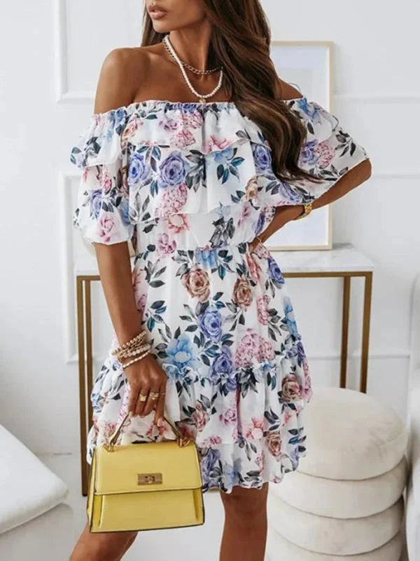 Off-shoulder floral mini dress with tiered design, perfect for a casual chic look. Made of comfortable and lightweight…