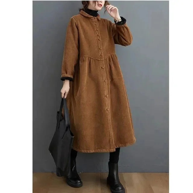 Brown structured warm dress with button-front detailing, crafted from high-quality fabric for a cozy yet stylish look.