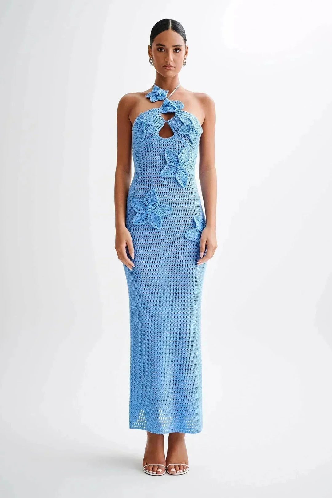 Handmade crochet maxi dress in Blue with intricate floral design, showcasing exquisite craftsmanship and romantic bohemian…