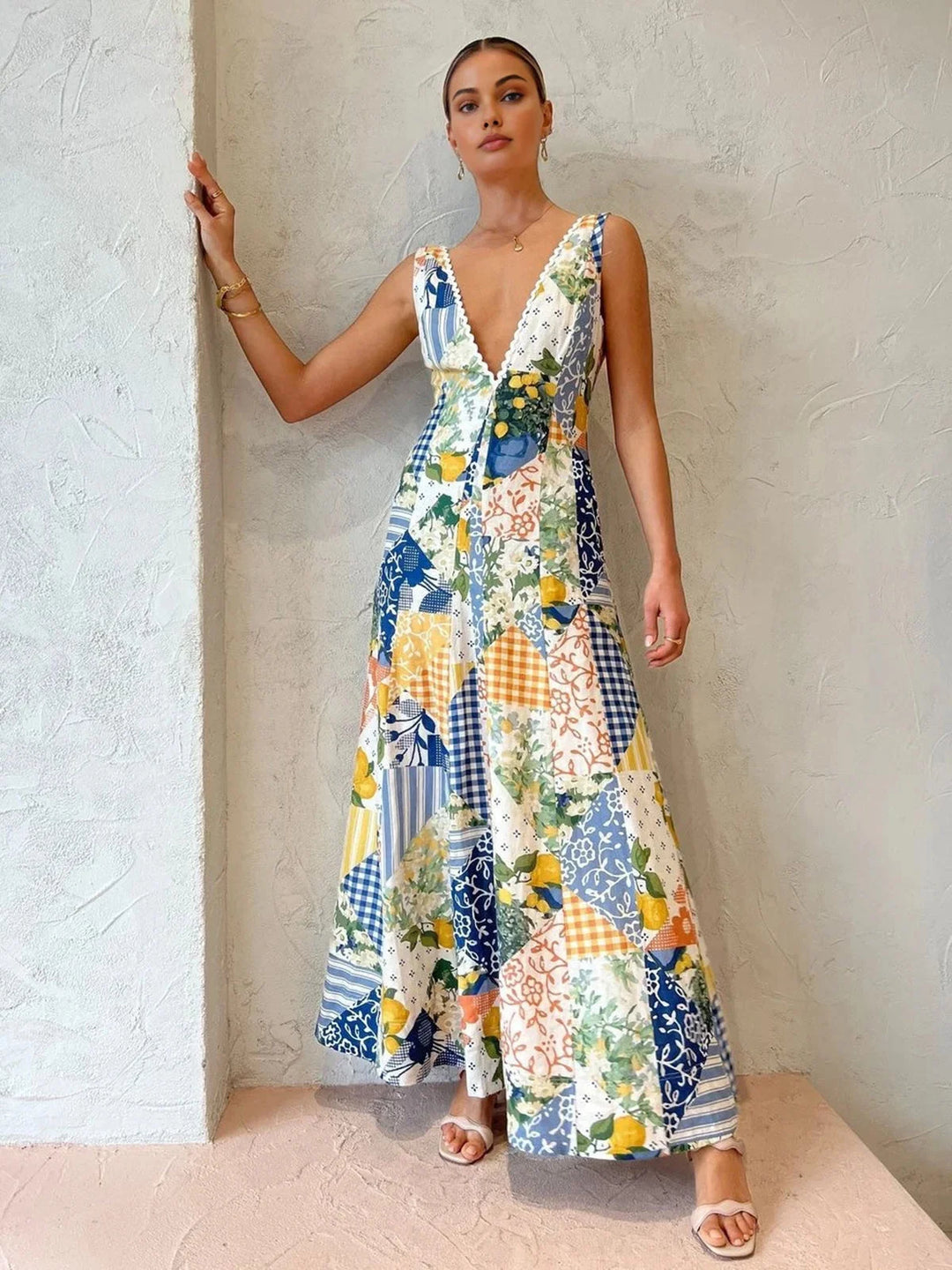 Sleeveless maxi dress in patchwork design, made with lightweight breathable fabric for a comfortable and stylish summer look.