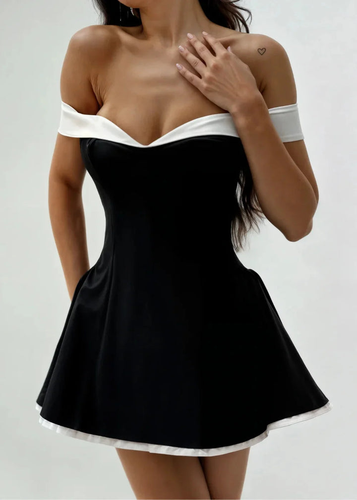 "Black off-shoulder dress with white trim and flared skirt, made of soft and stretchy fabric, perfect for a stylish and…