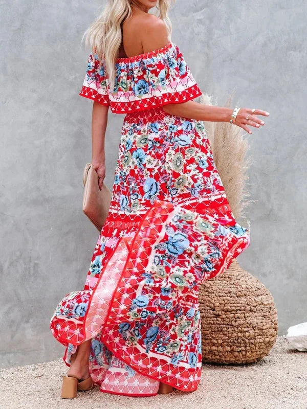 "Emiko maxi dress with floral pattern, tiered design, and belt cinch, made from lightweight fabric perfect for warm weather."