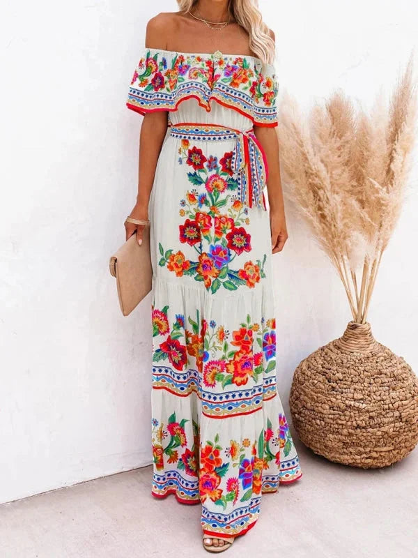 "Emiko - Floral tiered maxi dress with belt in breezy cotton blend fabric, featuring vibrant floral print and flattering…