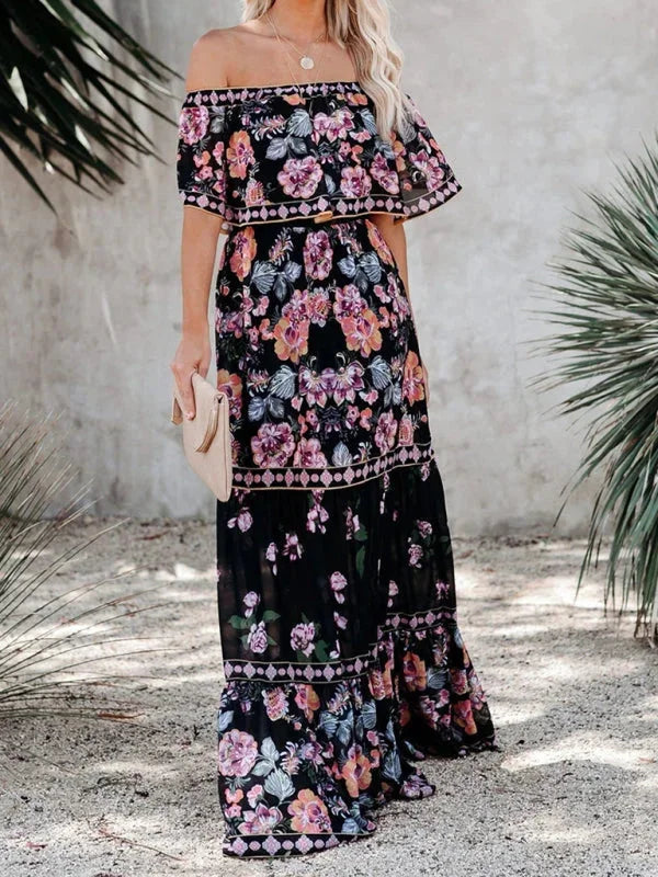 Floral tiered maxi dress in Emiko design with belt, made of lightweight flowy fabric, perfect for summer days or casual…