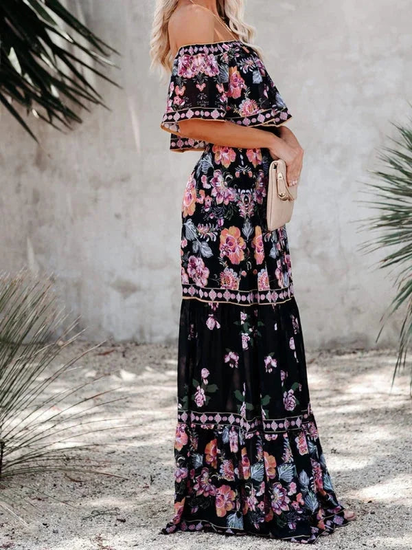 "Floral tiered maxi dress in soft fabric with waist belt, perfect for a stylish and feminine look."