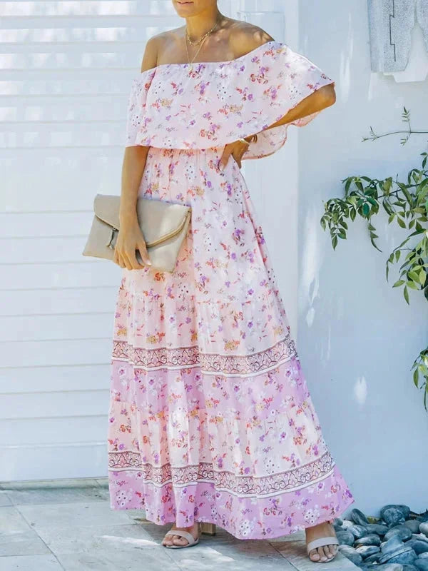 Floral tiered maxi dress with belt, featuring a flowy design in a lightweight fabric perfect for a bohemian-inspired summer…