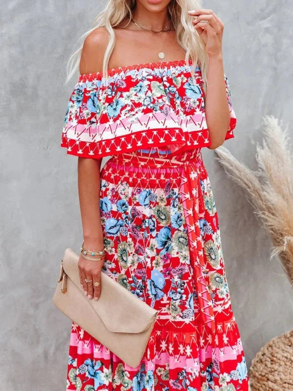 Floral tiered maxi dress with belt in soft, flowy fabric, perfect for a breezy yet elegant look.