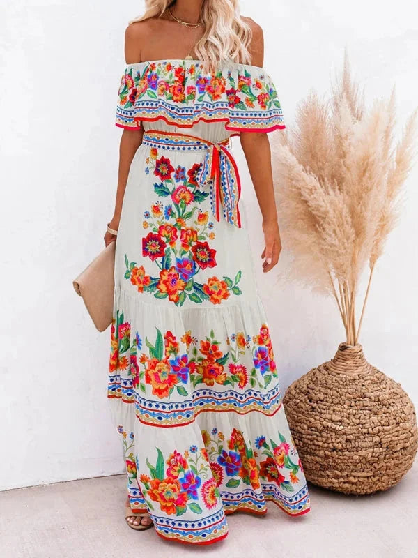 "Floral tiered maxi dress with belt featuring a soft cotton blend fabric and whimsical floral print, perfect for a casual…