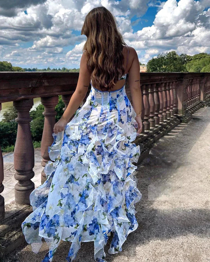 Blue floral tiered dress with ruffles showcasing a delicate design perfect for a casual summer day out, made from…