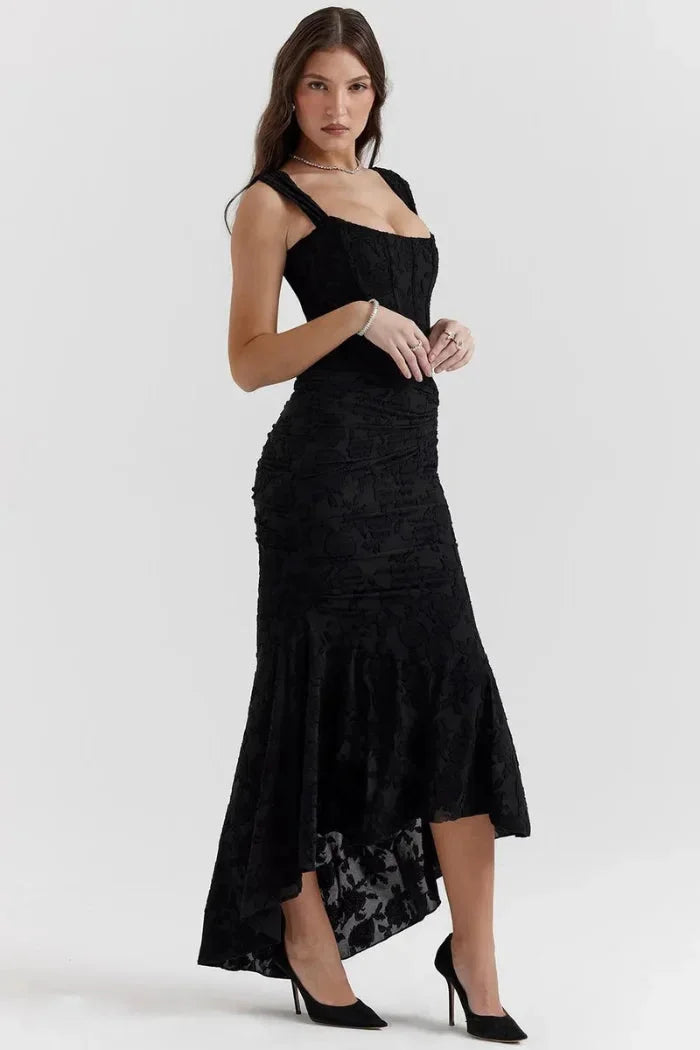 Black sleeveless midi dress featuring elegant floral lace design, perfect for a sophisticated and stylish look.