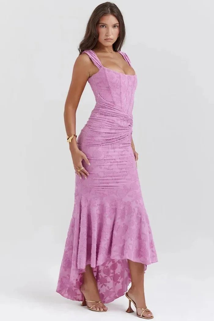 Sleeveless pink midi dress with floral lace overlay, perfect for special occasions.