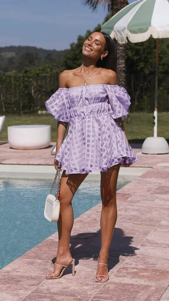 Off-shoulder mini dress in Purple, featuring a stylish design with a unique off-shoulder neckline. Made from comfortable and…