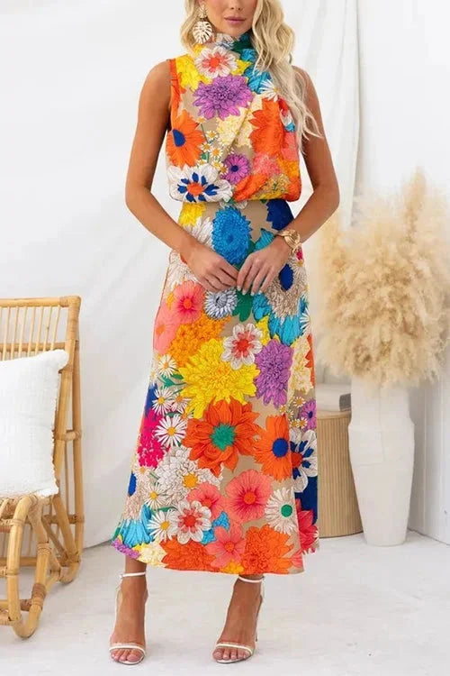 "Vibrant floral halter maxi dress featuring a bold floral print on soft, flowy fabric, perfect for a summer day out."