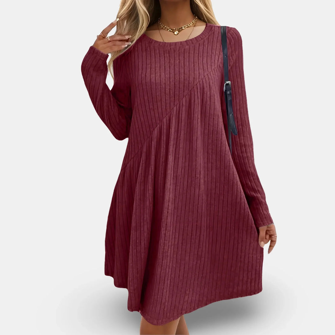 Red textured swing mini dress with long sleeves in Jailyn. Soft and stretchy fabric perfect for a casual yet stylish look.