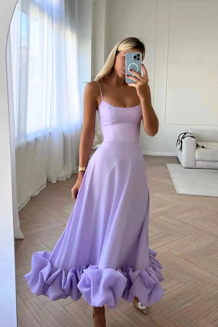 Lilac sleeveless maxi dress with ruffled tiers, showcasing a flowy design in a breezy fabric.