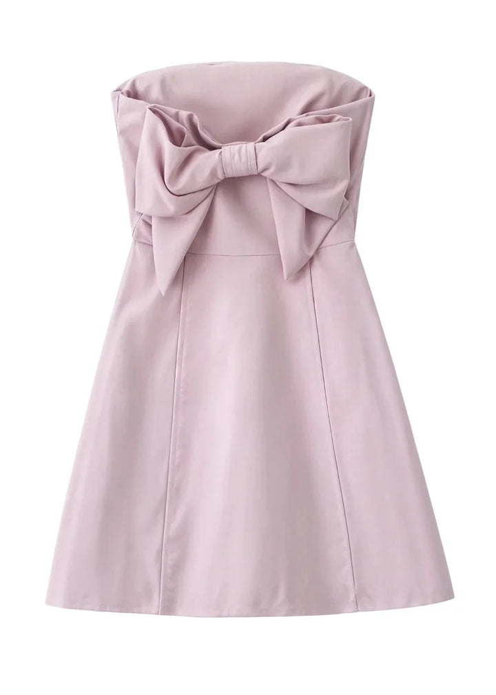 Blush strapless mini dress and matching clutch set in soft fabric with intricate design details.