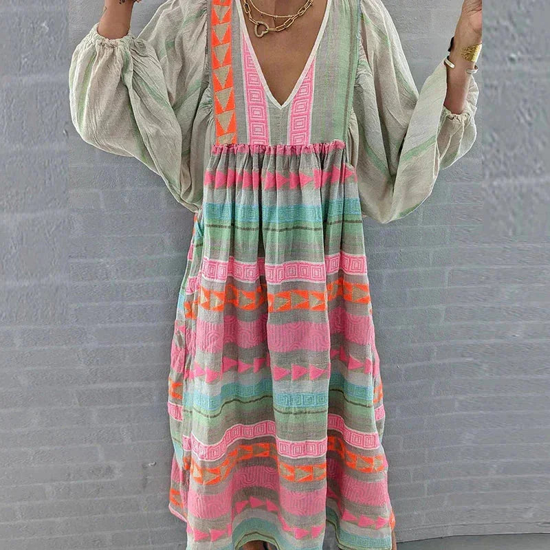 "Striped cotton maxi dress in pastel tones, perfect for a summery look, featuring a breezy design by Kalei."