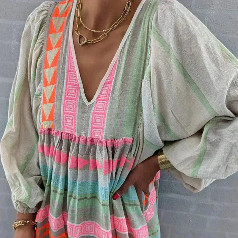 Striped cotton maxi dress in pastel tones, perfect for a casual day out or summer get-togethers.