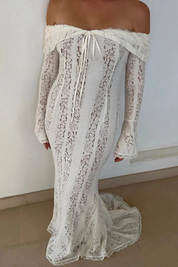 "Kasandra off-shoulder dress in ivory lace with bell sleeves, elegant and feminine design perfect for special occasions."