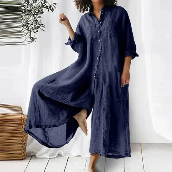 "Kaylani maxi dress in flowy fabric with buttoned front and convenient pockets in a relaxed drape style."