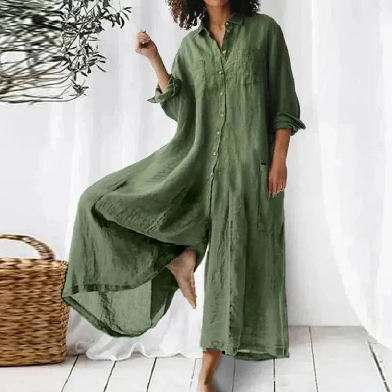 Green flowy buttoned maxi dress with pockets, made from soft, breathable fabric. Features a relaxed fit and stylish button…