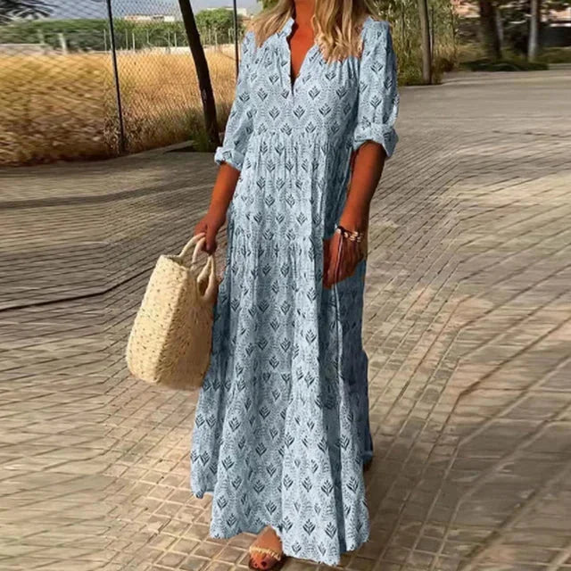 Blue Flowy V-Neck Maxi Dress: Effortlessly chic with a relaxed fit, this dress in soft fabric drapes beautifully for a…