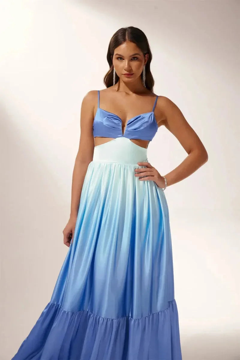 "Kenley - Ombre blue maxi dress featuring chic cut-outs, perfect for a relaxed yet sophisticated look."