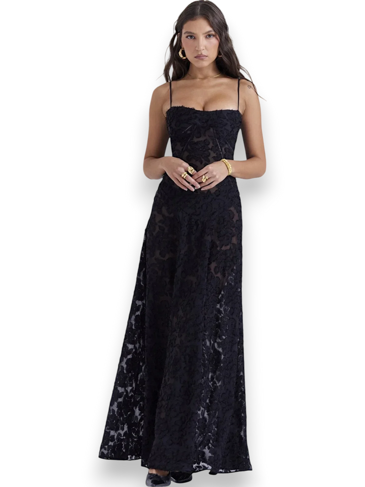 Black embroidered maxi dress with spaghetti straps, perfect for a casual yet elegant look. Crafted in soft, comfortable…